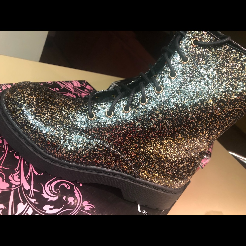 Shiny combat boots